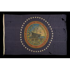 EXCEPTIONAL NEW HAMPSHIRE STATE FLAG WITH A HAND-PAINTED SEAL, SURROUNDED BY 45 HAND-SEWN STARS, MADE BY LAMPRELL & MARBLE, BOSTON, CA 1896-1907