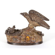 PAINTED, MECHANICAL, CAST IRON BANK WITH AN EAGLE FEEDING EAGLETS, MADE BY STEVENS, circa 1883