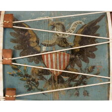 PAIR OF MAMMOTH, PAINT-DECORATED, AMERICAN LONG DRUMS OF EXQUISITE QUALITY, BOTH PAINTED ALL-THE-WAY AROUND, ONE WITH A DYNAMIC EAGLE & 14 STARS ON A PRUSSIAN BLUE GROUND, THE OTHER WITH A GOLD EAGLE & 16 STARS, IN A BLUE WREATH, ON A YELLOW & ORANGE GRAIN-DECORATED GROUND, BOTH MADE circa 1845 - 1865