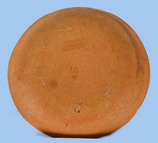 PENNSYLVANIA REDWARE PLATE BY MEDINGER, SLIP-DECORATED WITH RARE IMAGE OF A HORSE