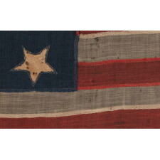 EXTREMELY RARE 14-STAR, 13-STRIPE FLAG, LIKELY MADE DURING THE ANTEBELLUM WITH AN ABOLITIONIST MESSAGE, ENTIRELY HAND-SEWN AND WITH ENDEARING WEAR FROM OBVIOUS USE, POSSIBLY OF U.S. NAVY ORIGIN, circa 1846-1848; EXHIBITED AT THE MUSEUM OF THE AMERICAN REVOLUTION FROM JUNE – SEPTEMBER, 2021