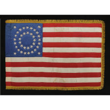 RARE & BEAUTIFUL 38 STAR ANTIQUE AMERICAN FLAG, AN INDIAN WAR PERIOD MILITARY GUIDON, MADE OF SILK AND ENTIRELY HAND-SEWN, WITH EMBROIDERED STARS IN A MEDALLION CONFIGURATION, 1876-1889, COLORADO STATEHOOD
