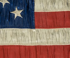 RARE AND BEAUTIFUL 38 STAR FLAG, AN INDIAN WARS PERIOD FLANK GUIDON OF THE 4th U.S. INFANTRY, WITH A MEDALLION CONFIGURATION SURROUNDING THE NUMERAL "4".  1876-1889, COLORADO STATEHOOD