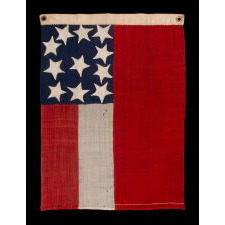 VERY RARE CONFEDERATE NAVAL ENSIGN IN THE FIRST NATIONAL (STARS & BARS) PATTERN, IN AN EXTRAORDINARY, SMALL SIZE, WITH 11 WHIMSICAL, SINGLE-APPLIQUÉD STARS AND A CURIOUSLY WIDE RED BAR, ENTIRELY HAND-SEWN, MADE BETWEEN MAY - NOVEMBER OF 1861: