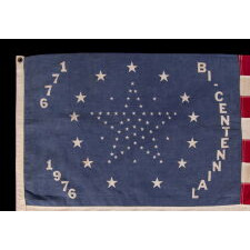 RARE AND EXCEPTIONAL 1976 BICENTENNIAL CELEBRATION FLAG WITH 56 STARS, DESIGNED BY HENRY FREDETTE OF LEOMINSTER, MASSACHUSETTS, COPYRIGHTED IN 1974