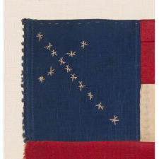 EXTRAORDINARY CONFEDERATE BIBLE FLAG IN THE FIRST NATIONAL FORMAT, MADE OF SILK RIBBON, WITH 14 EMBROIDERED STARS ARRANGED IN THE FORM OF A CANTED CHRISTIAN CROSS; ONE OF JUST THREE KNOWN EXAMPLES WITH A VARIANT OF THIS MAGNIFICENT STAR FORMATION