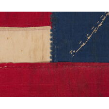 EXTRAORDINARY CONFEDERATE BIBLE FLAG IN THE FIRST NATIONAL FORMAT, MADE OF SILK RIBBON, WITH 14 EMBROIDERED STARS ARRANGED IN THE FORM OF A CANTED CHRISTIAN CROSS; ONE OF JUST THREE KNOWN EXAMPLES WITH A VARIANT OF THIS MAGNIFICENT STAR FORMATION