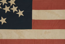 SPECTACULAR 38 STAR FLAG WITH A VERY RARE VARIATION OF THE "GREAT STAR" CONFIGURATION THAT HAS ADDITIONAL STARS BETWEEN EACH ARM, COLORADO STATEHOOD, 1876-1889