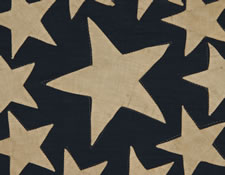 SPECTACULAR 38 STAR FLAG WITH A VERY RARE VARIATION OF THE "GREAT STAR" CONFIGURATION THAT HAS ADDITIONAL STARS BETWEEN EACH ARM, COLORADO STATEHOOD, 1876-1889
