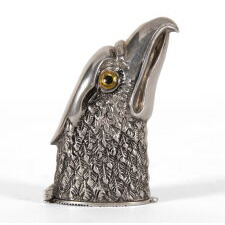 STERLING SILVER MATCH HOLDER IN THE FORM OF AN EAGLE’S HEAD, WITH BEAUTIFUL FORM AND INLAID, GLASS EYES, BRITISH, CIRCA 1900-1940