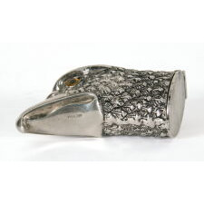 STERLING SILVER MATCH HOLDER IN THE FORM OF AN EAGLE’S HEAD, WITH BEAUTIFUL FORM AND INLAID, GLASS EYES, BRITISH, CIRCA 1900-1940