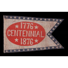 SWALLOW-TAILED PARADE FLAG / PENNANT WITH “1776 CENTENNIAL 1876” SET WITHIN A SUNBURNT, RED-ORANGE, EGG-SHAPED WINDOW, WITHIN A BLUE BORDER WITH 37 STARS; AN EXTREMELY RARE EXAMPLE, MADE TO CELEBRATE THE 100-YEAR ANNIVERSARY OF AMERICAN INDEPENDENCE