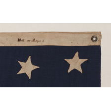 U.S. NAVY JACK WITH 30 STARS, AN ENTIRELY HAND-SEWN, PRE-CIVIL WAR EXAMPLE WITH MARKINGS FROM NEW YORK SHIPSMITH ISAAC HALL, WISCONSIN STATEHOOD, 1848-1850