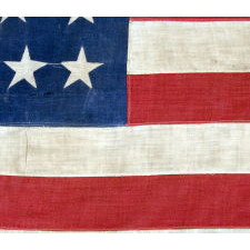 UNUSUAL ANTIQUE AMERICAN FLAG WITH 38 STARS ON A PAINT-PRINTED CANTON, ADJOINED TO 13 PIECED-AND-SEWN STRIPES, 1876-1889, COLORADO STATEHOOD