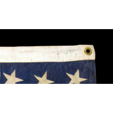 UNUSUAL ANTIQUE AMERICAN FLAG WITH 38 STARS ON A PAINT-PRINTED CANTON, ADJOINED TO 13 PIECED-AND-SEWN STRIPES, 1876-1889, COLORADO STATEHOOD