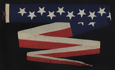 US NAVY COMMISSIONING PENNANT WITH 13 STARS IN A STAGGERED ROW, 1876 ERA, A RARE AND BEAUTIFUL EXAMPLE WITH HAND-SEWN STARS