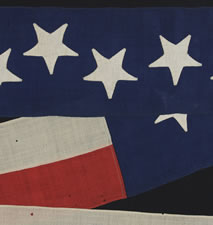 US NAVY COMMISSIONING PENNANT WITH 13 STARS IN A STAGGERED ROW, 1876 ERA, A RARE AND BEAUTIFUL EXAMPLE WITH HAND-SEWN STARS