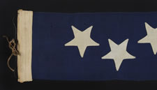 US NAVY COMMISSIONING PENNANT WITH 13 STARS IN A STAGGERED ROW, 1876 ERA, A RARE AND BEAUTIFUL EXAMPLE WITH HAND-SEWN STARS