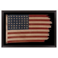 48 STAR ANTIQUE AMERICAN FLAG OF THE 1912-1918 ERA, LIKELY A U.S. NAVY SMALL BOAT ENSIGN, PRODUCED FOR U.S. INVOLVEMENT IN WWI (1917-18); THE EARLIEST IDENTIFIED EXAMPLE OF ANY KIND FROM PROMINENT U.S. FLAG-MAKER JOHN C. DETTRA, THE FIRM OF WHICH PRACTICALLY NEVER SIGNED FLAGS UNTIL POST-WWII (1945 & AFTER)